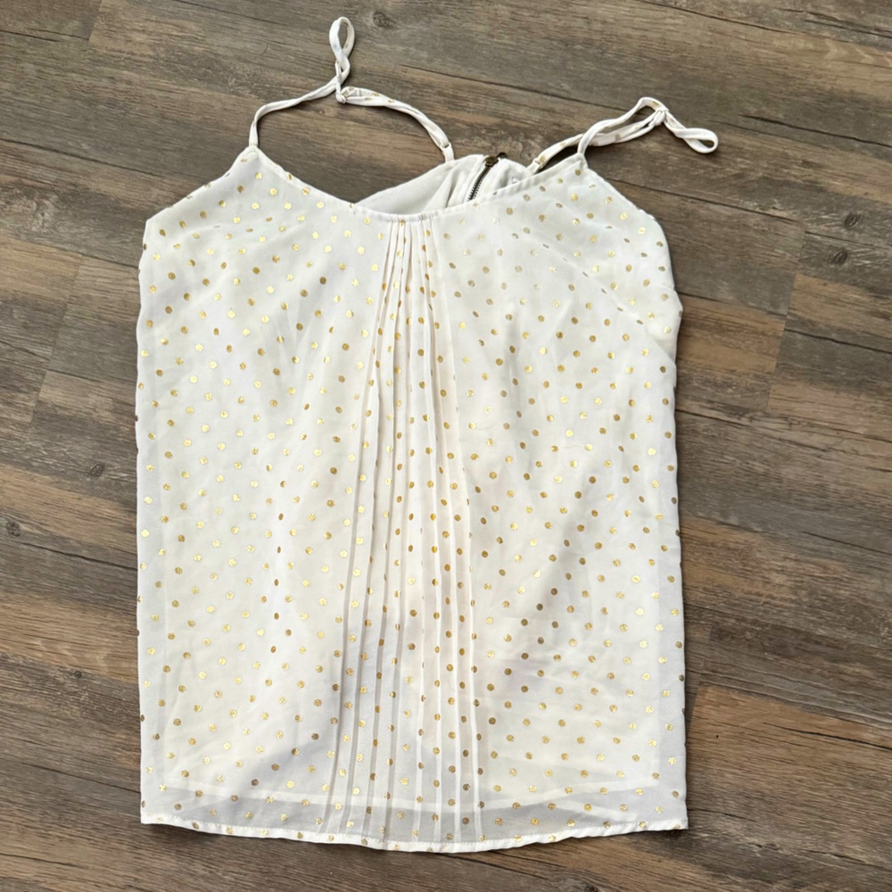 Excellent condition. Very cute top